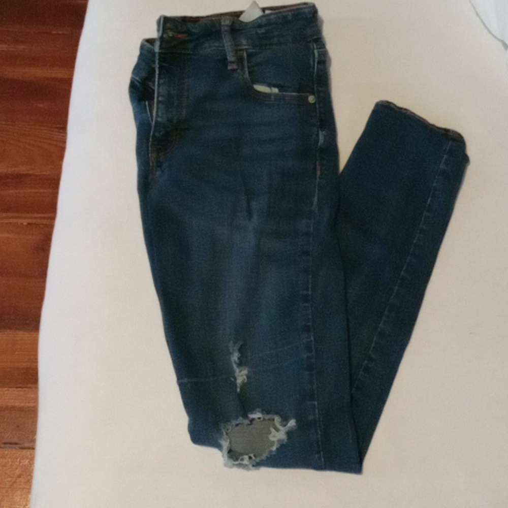 Ripped blue jeans